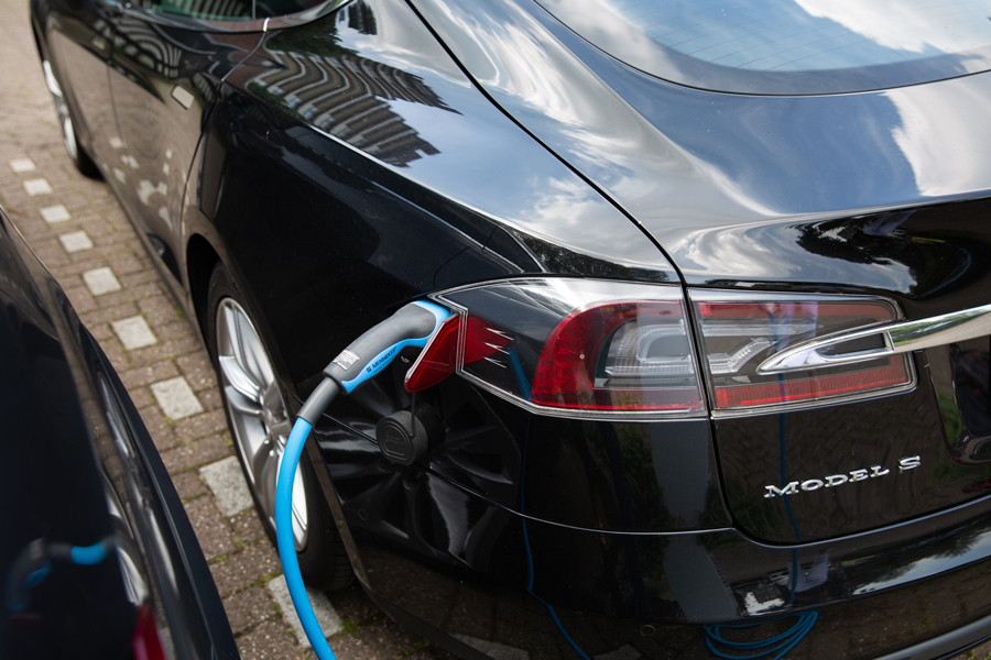 Electric car connected to a charging cable
